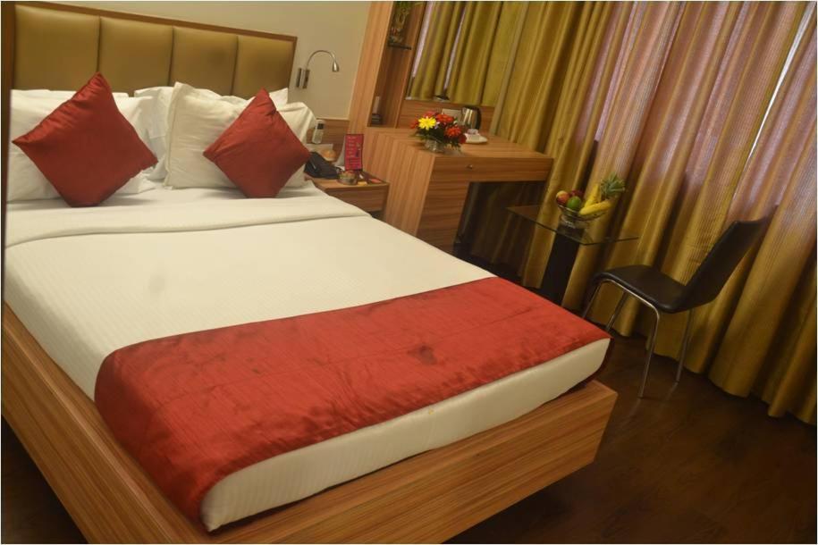 Hotel Plaza Bombaim Quarto foto